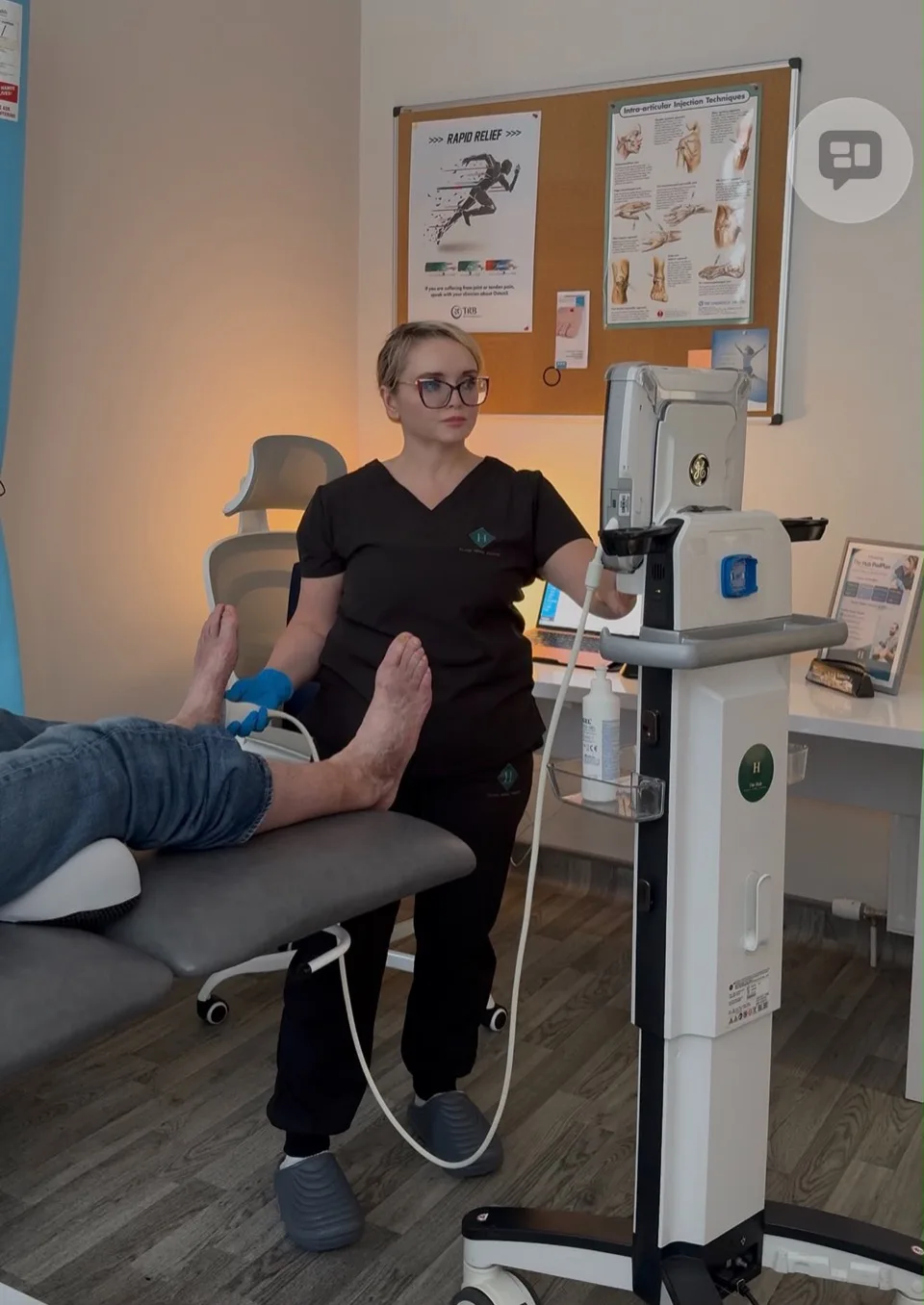 Sarah-Jane Walls carrying out a medical diagnostic ultrasound assessment at The Hub Glasgow